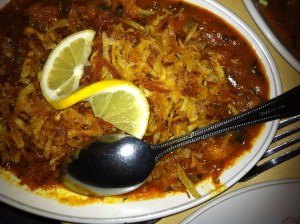 Chicken Shally. Sweet and sour dish with chipped potatoes on top